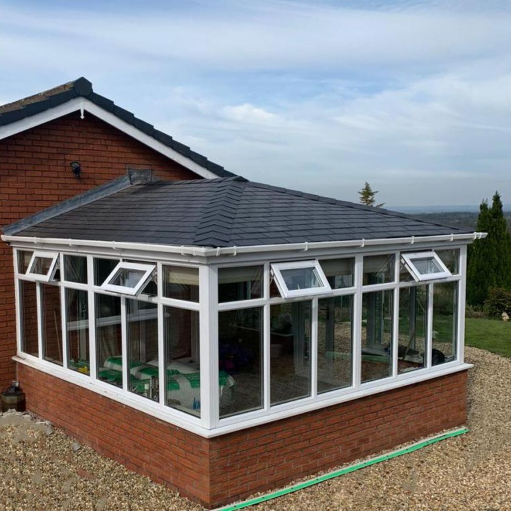 lightweight dark grey artificial slate roof tiles on conservatory
