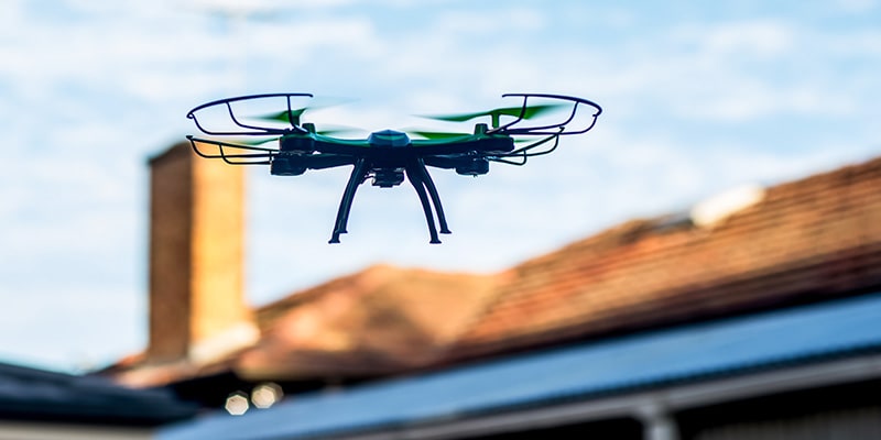 Drone flying above the roofs 