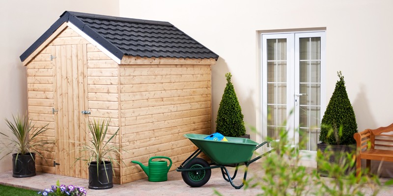Shed in residential garden setting.