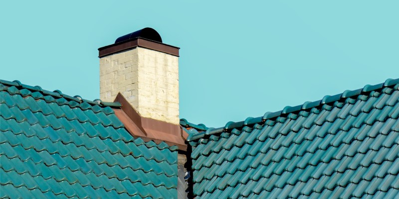 blue tiled roof with white chimney