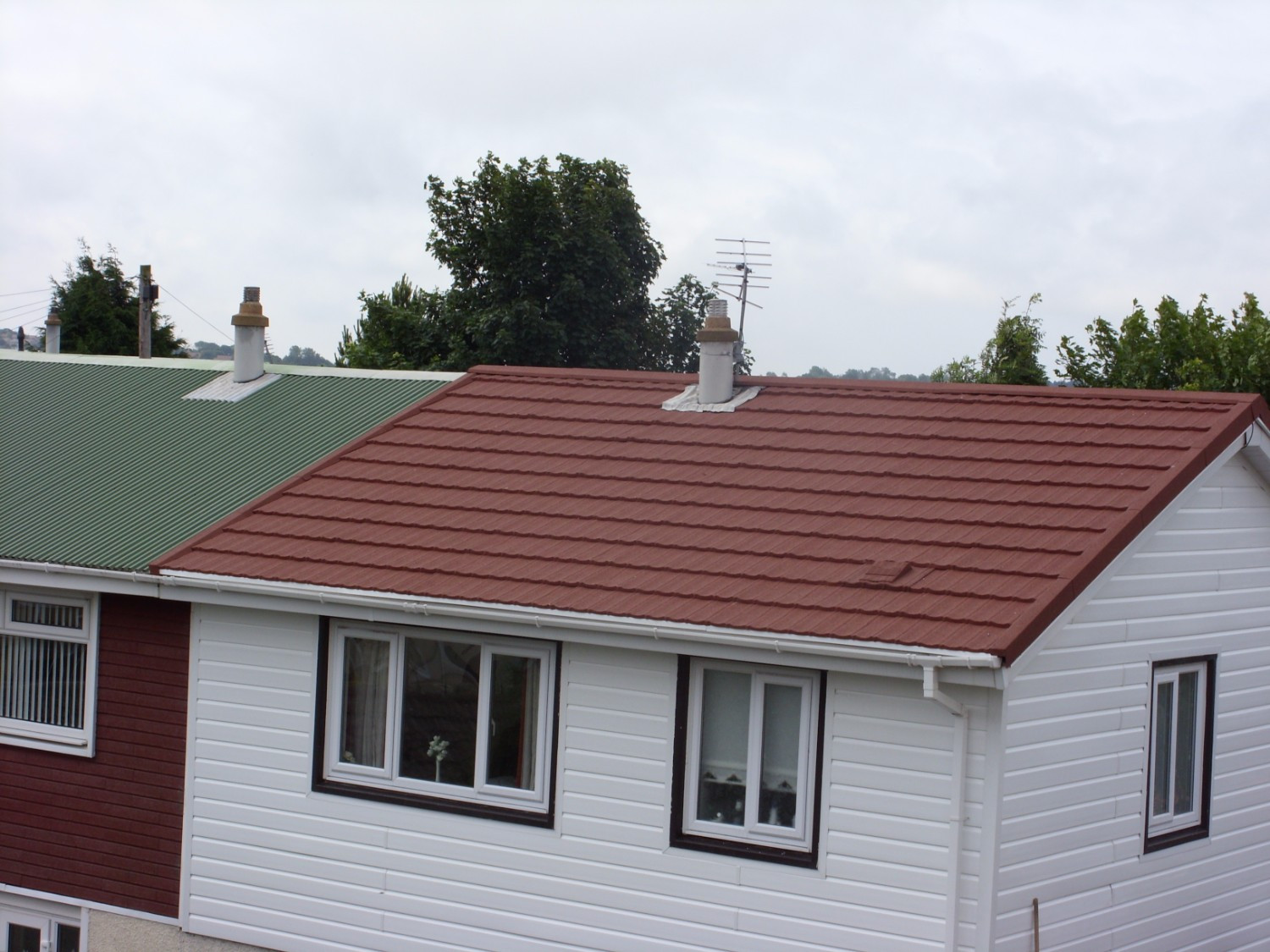 Lightweight Metal Roof Tiles on Houses Lightweight Metal Roof Tiles on Houses