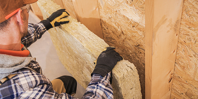 contractor using wool insulation