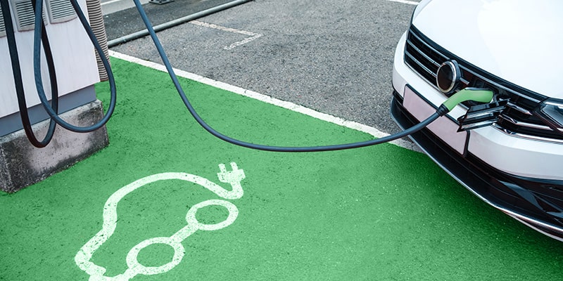 electric car at electric pump station