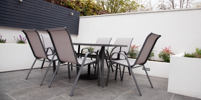 outdoor dining set on garden patio