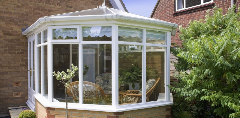 conservatory covered with polycarbonate roofing sheets