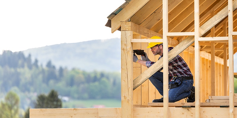 professional worker working on building