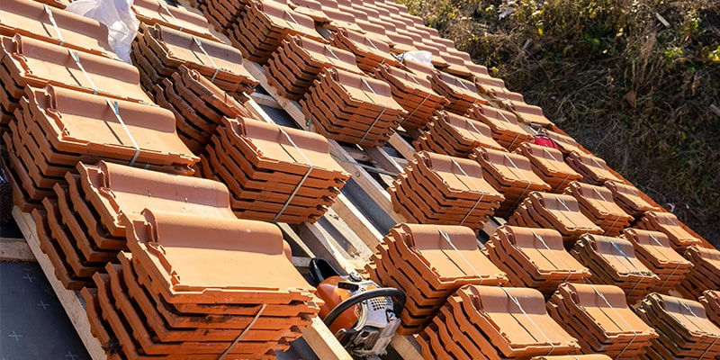 stacks of ceramic roofing tiles