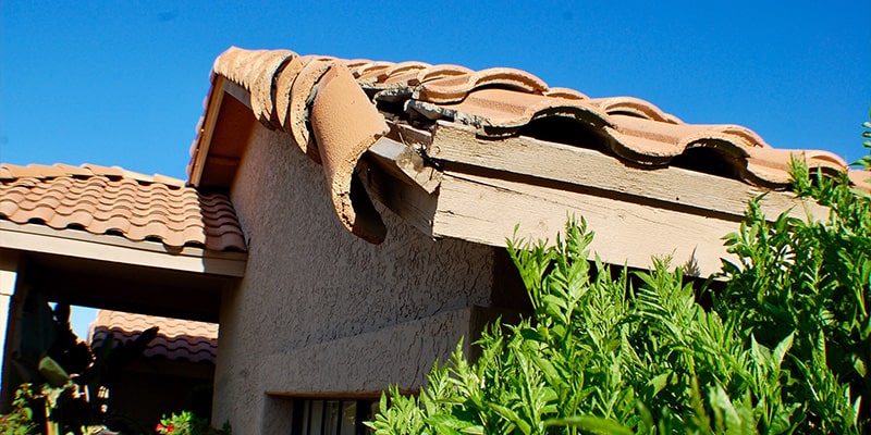 tile damage on corner of roof