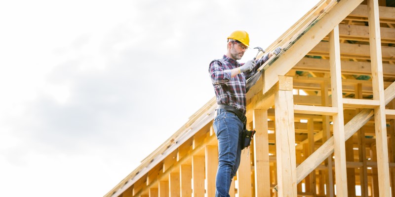 Tradesman working on roof